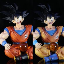 Dragon Ball Son Goku sitting and take ball anime f...